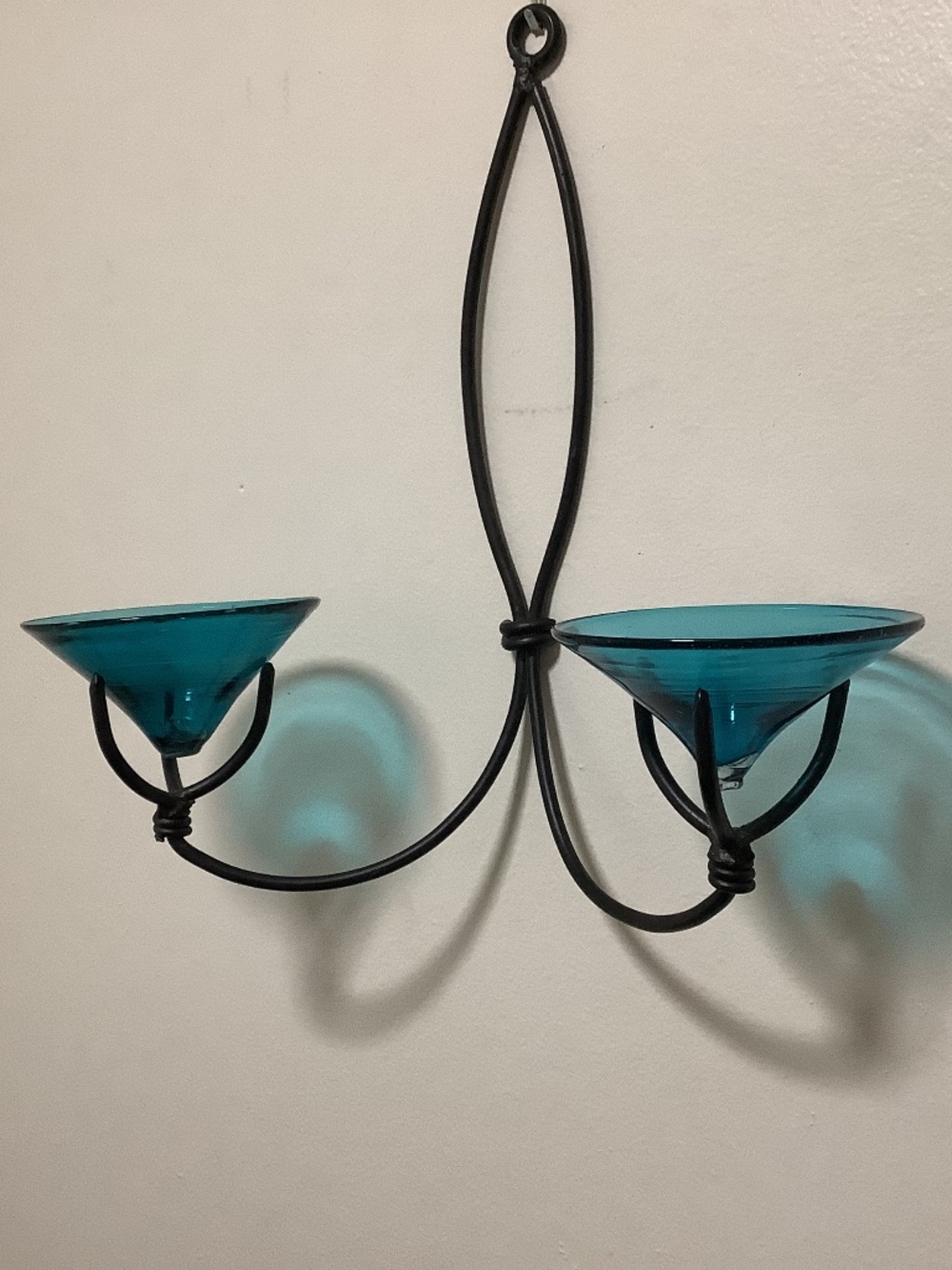 Artisan Black wrought iron wall sconce + hand crafted blue glass bowls